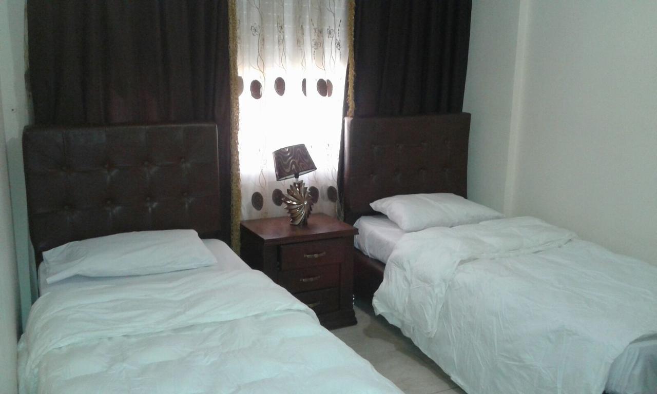 Al Tawheed Hotel Apartments Амман Экстерьер фото