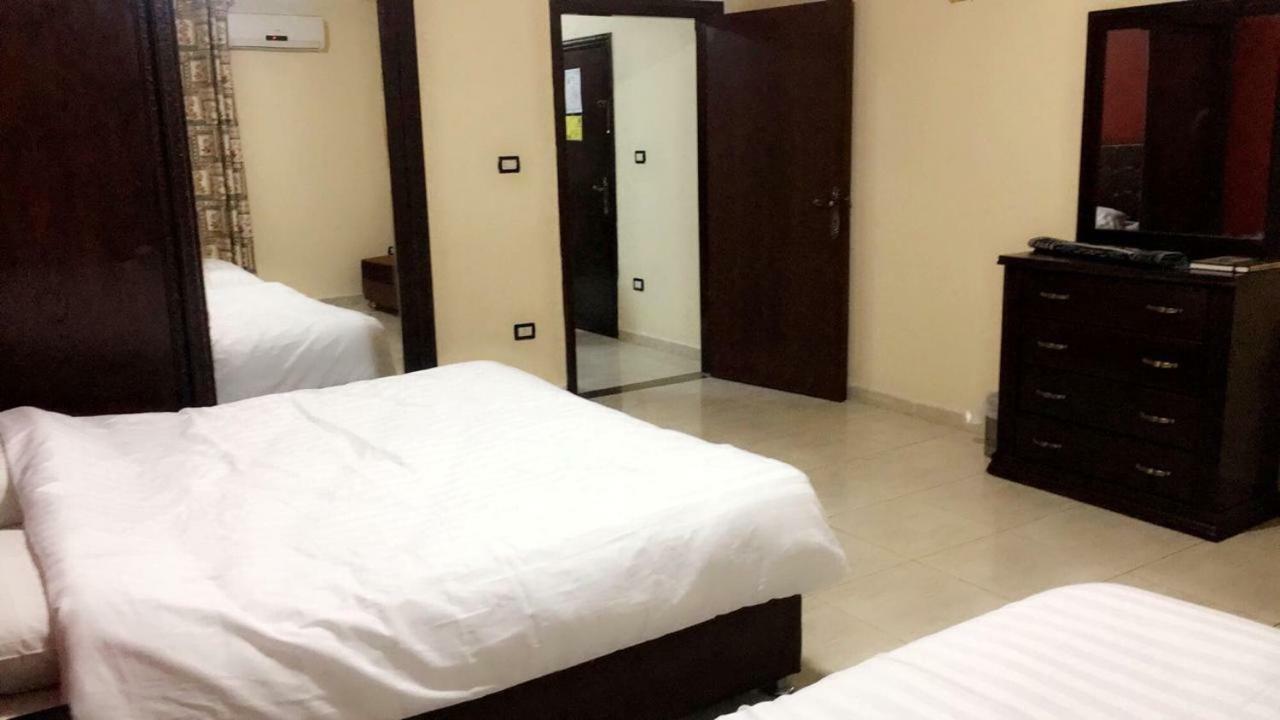 Al Tawheed Hotel Apartments Амман Экстерьер фото